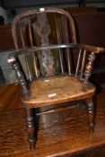 A C19th child's beach and elm windsor armchair