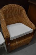 A modern wicker effect armchair