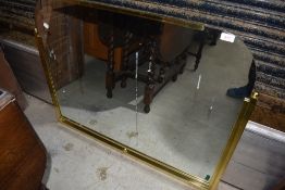 A vintage brass part framed mirror , width approx 95cm
