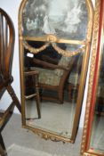 A mid C20th period style console wall mirror, having Watteau pictorial and swag decoration