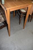 A vintage formica top drop leaf kitchen table of small proportions, approx 60cm wide