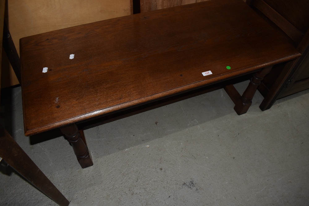 A late C20th oak rectangular top coffee table