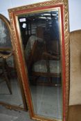 A mid/late C20th gilt effect wall mirror