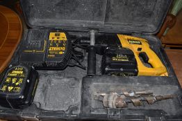 A cased rechargeable Dewalt hammer drill and accesories