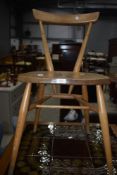 A mid century Ercol style stained frame designer chair