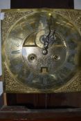 An 18th Century and later oak longcase clock having square pillar hood with 8 day movement and brass