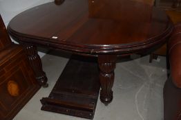 A Victorian style mahogany wind out dining table, on fluted bulbous legs, open w 200cm