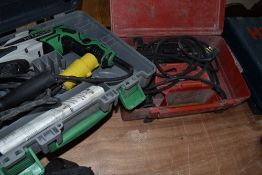 A cased Hitatchi Koki Hammer drill and similar Bosch drill