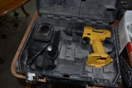 A cased DeWalt rechargeable drill, not battery