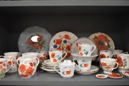 A mixed selection of ceramics having poppy patterns,including Kahla and Duchess.