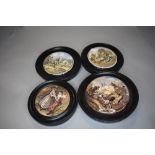 Four antique paste pot lids mounted in wooden frames.AF