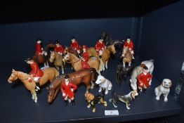 A vintage ceramic hunting scene including dogs and horses with riders, also included are two metal