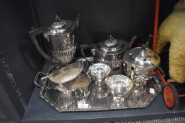 A selection of silver plate including butler's tray, four piece tea and coffee set by
