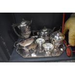 A selection of silver plate including butler's tray, four piece tea and coffee set by