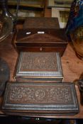 Three intricately carved Anglo Indian boxes and a 19th century tea caddy,two boxes having micro