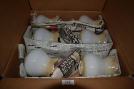 A box of vintage glass lamp shades.