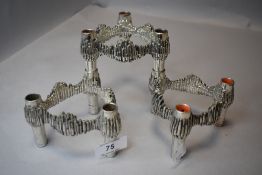 Three 1960s modular interlocking candle stick holders.