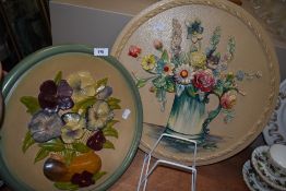 Two vintage floral chalk ware wall plaques.