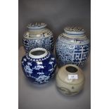 Two large Chinese ginger jars having blue and white pattern and two similar examples.