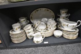 A collection of Royal Doulton 'Larchmont' dinner service, including soup bowls, plates, gravy boat