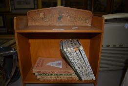 A Peter rabbit childs book case and ten Beatrix potter books.