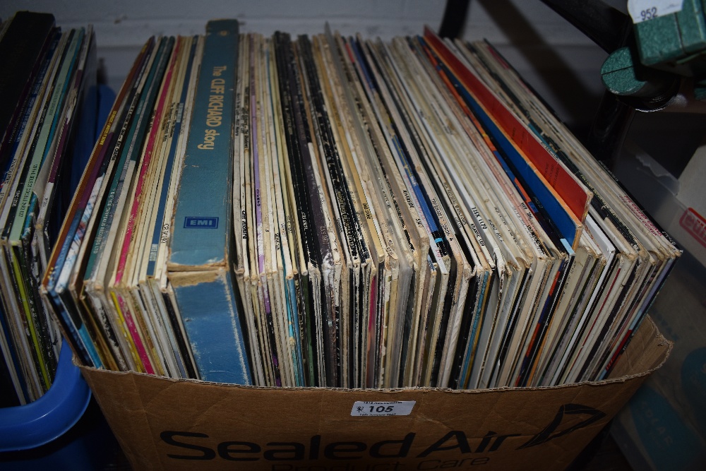 A selection of vinyl records and albums including pop interest 80 records