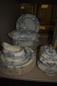 An early 2oth century tureen,plates, serving dish and gravy boat having blue and white transfer