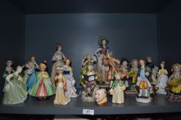 A collection of figurines including Beswick and Doulton.