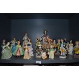 A collection of figurines including Beswick and Doulton.