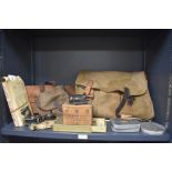 A selection of vintage fishing equipment including bags, reels, cast box and more, including Hardy