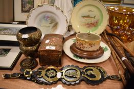 A selection of hardware including fish design plates and copper items