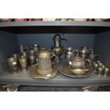 A varied lot of vintage and antique pewter ware including plates, beakers, tankards and more,
