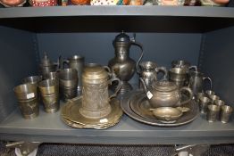 A varied lot of vintage and antique pewter ware including plates, beakers, tankards and more,