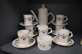 A vintage mid century Crown Clarence coffee set having floral pattern to white ground and blue