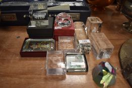 An assortment of paper weights including Dartington.