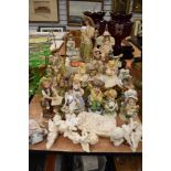 A mixture of figurines and collectable ornaments.