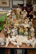 A mixture of figurines and collectable ornaments.