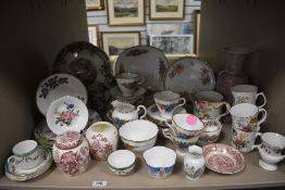 A varied lot of ceramics including Masons ginger jars,hand painted floral cups,saucers and plates,