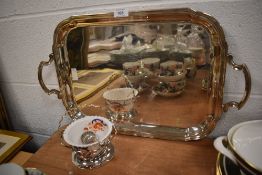 A large silver plated butlers tray of plain form with raised rim and long service presentation