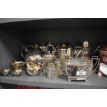 A selection of silver plate including preserve jar, sugar casters including Wembley souvenir,