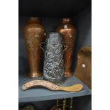 A pair of embossed copper vases in the Art Nouveau style,both marked to undersides, another