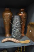 A pair of embossed copper vases in the Art Nouveau style,both marked to undersides, another