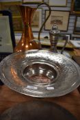 A large copper jug,a middle eastern tea/chocolate pot, and a chase work bowl.