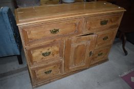 A Victorian pine sideboard/dresser base in the Aesthetic style