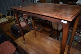 An oak side or hallway table on shaped legs