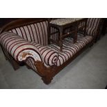 A reproduction scroll arm settee in the Regency style with hardwood frame and striped classical