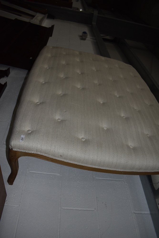 A large upholstered lounge seat