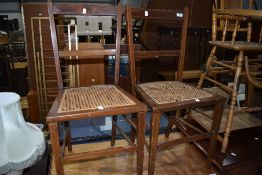 A pair of Edwardian cane seated bedroom chairs