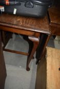 A traditional oak gateleg table having interesting frame being on cabriole legs , width approx.