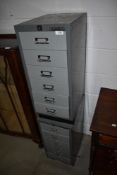 Two modern sets of metal filing drawers